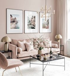 a living room with pink walls and furniture