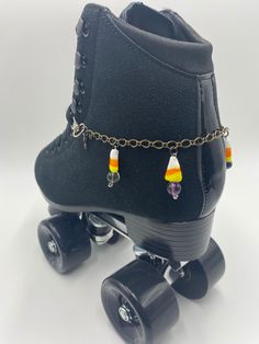 The perfect skate chain to show off your Halloween spirit! Made with glass candy corns, and real gem stone beads!  All of our skanklet's are made with jewelry grade materials, but we don't recommend these for more aggressive skaters like jam skaters, park skaters, or derby skates. For Moxi lolly's, Impalas, and Jackson Vista's choose an 8 inch chain.  For Boardwalks, Drifters, Beach Bunnies, and Rainbow Riders choose a 10 inch chain.  For all other skates, please feel free to message me! Derby Skates, Lifestyle Board, Glass Candy, Roller Skate, Halloween Spirit, Anklet Jewelry, Gem Stone, Candy Corn, Spirit Halloween