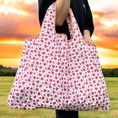 Strawberry Print Reusable Bag These bags are so Versatile and great for many uses Great quality and perfect for travel or a trip to the beach Large polyester bag that folds up to fit in the palm of your hand Excellent for laundry, groceries or anything you need to carry. Very durable! 100% Polyester Product Measurements: Height 15.7 in. Width 0.4 in. Length 22.8 in. Cheap Shoulder Bag For Valentine's Day, Cheap Trendy Heart Print Bags, Cartoon Strawberry, Foldable Shopping Bag, Embroidered Tote Bag, Embroidered Tote, Tshirt Bag, Travel Tote Bag, Cute Strawberry