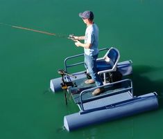 a man fishing on a small boat in the water