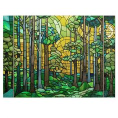 a stained glass window with trees in the background