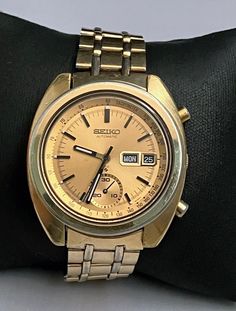 Rare Seiko 6139-6015 'Gold Bruce Lee' Chronograph Automatic - 1972 With rare original gold Seiko bracelet. Watch and Bracelet in very good condition. Gold plated; Plating showing typically issues with wear, but it is not so bad that the watch is not attractive;  The Dial is beautiful;  Watch keeps time (approx. +30sec/day);  Chronograph start/stop ok;  Reset to zero ok  (sub dial hand off just a little);  Quick day/date setting works - English/Spanish; Date - 1972/9 Movement very clean and has n Vintage Gold Chronograph Watch, Gold Chronograph Collectible Watches, Collectible Gold Chronograph Watch, Vintage Gold Chronograph Watch For Formal Occasions, Gold Vintage Automatic Chronograph Watch, Gold Automatic Chronograph Watch For Anniversary, Vintage Yellow Gold Chronograph Watch, Retro Gold Watches With Chronometer, Gold Retro Watches With Chronometer