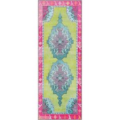 a colorful rug with an ornate design on the front and back side, in pink, green