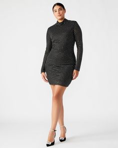 Elevate your style with our KRISTA dress. This long-sleeved mini dress features a mock neck and back zipper closure. This stunning dress also features unique square-shaped rhinestone stud embellishments for a touch of glamour. Make a statement with this elegant and sophisticated piece, perfect for any occasion. Long-sleeved bodycon mini dress Square-shaped rhinestone embellishments Back-zipper closure Length: 33.5" 87% polyester 13% elastane Hand wash Stephanie is 5ft 10in and is wearing a size Rhinestone Embellishments, Spring Tops, Spring Looks, Long Sleeve Bodycon, Long Sleeve Mini, Sweaters Knitwear, Long Sleeve Mini Dress, Bodycon Mini Dress, Stunning Dresses