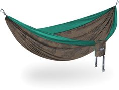 a green and brown hammock hanging from a metal pole with two straps on it