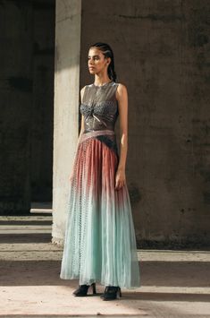 Gradient dyed and gathered silk organza skirt with hand-embroidered and handwoven silk-raffia and lurex tulle waistbands. Fabrics - Organza (100% Silk) + Lurex Tulle (50% Lurex 505 polyester) + Silk Raffia Embroidery (35% Silk 35% Raffia 30% Cotton Textured Yarns) + Metalic Underlay (100% Polyester) + Satin Lining (100% Viscose)EXTRA SMALL: 32 inches (bust), 25 inches (waist), 34 inches (hips).SMALL: 34 inches (bust), 27 inches (waist), 36 inches (hips).MEDIUM: 36 inches (bust), 29 inches (waist Ombre Fabric, Organza Skirt, Sheer Bodysuit, Textured Yarn, Lakme Fashion Week, Satin Color, Indian Fashion Designers, Silk Organza, Skirts Online