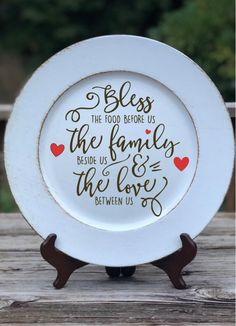 a white plate sitting on top of a wooden table