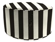 a black and white striped ottoman