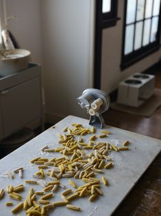 a bunch of food that is sitting on a table in front of a stove top