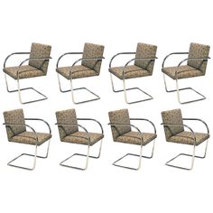 six chairs with chrome frame and fabric upholstered seats