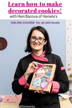 a woman holding up a box with cookies in it and the text learn how to make decorated cookies with han bacova of hannel's online course for all skill levels