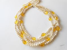 Vintage Pearl Necklace, Yellow and White, Four Strand Necklace Yellow Pearl Necklaces With Round Beads, Yellow Pearl Beaded Necklaces As Gift, Yellow Beaded Pearl Necklace Gift, Yellow Beaded Pearl Necklace, Yellow Beaded Pearl Necklace As Gift, Yellow Pearl Necklace Gift, Yellow Pearl Necklace As Gift, Yellow Pearl Necklace For Gift, Pearl Bead Necklace