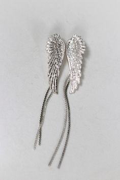 Gorgeous angel wings earrings with two dainty chains dangling off on each side. The angel wing symbolizes protection, purity, courage, love, and harmony. This piece is meant to carry that energy.Measurements: Angel wings: 2 inches Chains: 3 inches* Items marked preorder will take 4 - 12 weeks to create.* Comes wrapped in a pretty gift package. * Choose between 14k gold, rose gold or silver plated brass. Boho Wedding Hair Accessories, Angel Wings Earrings, Egypt Jewelry, Boho Wedding Jewelry, Bridal Cuff, Wings Earrings, Accessories Boho, Elven Jewelry, Goddess Jewelry