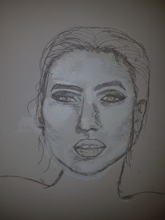 a drawing of a woman's face is shown