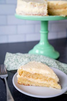 a piece of cake sitting on top of a plate next to a knife and fork