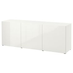 a white cabinet with three doors and two drawers on the front, against a white background