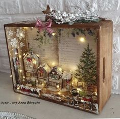 a wooden box with christmas decorations on it