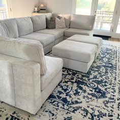 a couch and ottoman in a living room