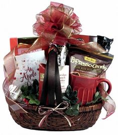 a gift basket filled with coffee, chocolates and candy