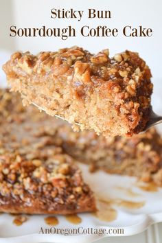 sticky bun sourdough coffee cake on a white plate with a spoon in it