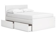 a white bed with two drawers underneath it