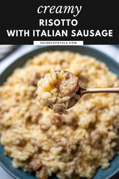 a spoonful of risotto with italian sausage over rice on a blue plate