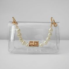 Beautiful And Chic Small Purse That Goes Perfect With Any Outfit. Brand New Color: Clear With Gold And Pearl Accents Size: 8.5x5x3 Elegant Crossbody Bag With Clear Strap, Elegant Shoulder Bag With Clear Strap, Elegant Crossbody Shoulder Bag With Clear Strap, Elegant Bag With Clear Strap For Daily Use, Elegant Bags With Clear Strap For Daily Use, Elegant Clear Bag For Daily Use, Elegant Party Shoulder Bag With Clear Strap, Elegant Rectangular Shoulder Bag With Clear Strap, Elegant White Bag With Clear Strap