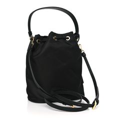 This is an authentic PRADA Re-Nylon Saffiano Mini Re-Edition 1978 Bucket Bag in Black. This small bucket bag is crafted of fine nylon in black with matching black saffiano leather trim. It features a saffiano leather handle and optional adjustable shoulder strap, and gold hardware. The top cinch cord releases to a black Prada logo jacquard interior. Small Bucket Bag, Prada Nylon, Prada Logo, Zip Tote, Chain Crossbody Bag, Small Shoulder Bag, Blue Ink, White Bag, Prada Bag