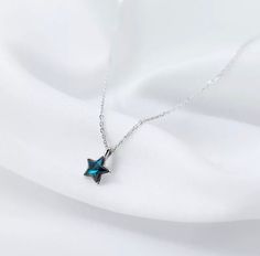 This blue star necklace is perfect for a Sweet 16, Quinceañera or just for everyday wear! Add a pop of color to your jewelry!  Materials: 925 Sterling Silver  Quality: Hypoallergenic & Tarnish-resistant  ♥ Each item will be individually packed with love and care!  ♥ If this is a gift, please let me know so that I can gift wrap and add in a note for you!  ♥ Please let me know if you have any questions or concerns about the item! Blue Necklace With Star Charm As A Gift, Blue Star Charm Necklace For Gift, Blue Star Sapphire Necklace, Blue Star-shaped Adjustable Necklace, Blue Star-shaped Gemstone Necklace, Teen Gifts, Jewelry Materials, Necklace Bridal, Necklace Blue