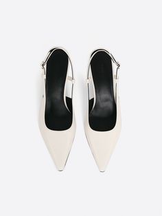 Editor's NotesRareness' shoes are designed for comfortable and elevated essential styles.- Slingback heeled pumps- Subtle glossy leather- Adjustable buckle strap- Kitten heel- Glossy leather texture- Slim pointed toe- Minimal and chicMeasurements(in.)- Size:: KR 225MM(US 5.5) ~ KR 260MM(US 9)- Heel height: 2.4  in* Fits true sizeComposition & Care- UPPER:  Cow Leather- LINING: Pigskin Leather- INSOLE: Kidskin Leather- Avoid direct heat and moisture- Professional cleaning is recomme Patent Leather Slingback Pumps With Removable Insole For Office, Patent Leather Slingback Pumps With Buckle, Patent Leather Open Heel Slingback Pumps For Office, Modern Slingback Sandals With Buckle And Pointed Toe, Classic Slingback Pumps With Ankle Strap And Buckle, Sleek Slingback High Heel Pumps With Buckle Closure, Sleek High Heel Slingback Pumps With Buckle Closure, Business Court Shoes With Ankle Strap And Sculpted Heel, Modern Court Shoes With Ankle And Heel Strap