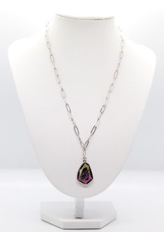 The Beautiful Silver Chain with Dark Amethyst Paved Pendant Necklace showcases a stunning interplay between a delicate silver chain and a pendant adorned with dark amethyst stones in a pave setting, creating an elegant and alluring accessory. This necklace effortlessly adds a touch of sophistication and mystique to your ensemble, making it a perfect choice for both formal events and everyday wear. Dark Amethyst, Amethyst Stones, Pave Pendant, Pave Setting, Amethyst Stone, Tennis Bracelet, Formal Event, Silver Chain, Statement Necklace