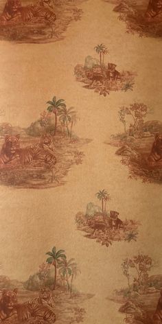 the wall paper has tigers and palm trees on it, along with other animals