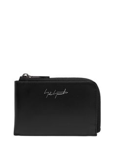 logo-print leather wallet from YOHJI YAMAMOTO featuring jet black, logo print to the front, all-around zip fastening, main compartment, internal card slots and leather. Yohji Yamamoto, Odds And Ends, Black Logo, Printed Leather, Face Skin, Online Shopping Clothes, Jet Black, Logo Print, Purse Wallet