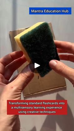 a person holding a sponge in front of a cardboard box with information about how to use it