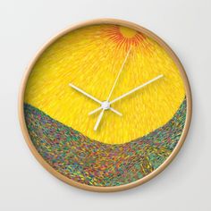 a yellow clock with an abstract painting on it