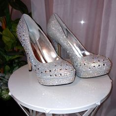 Women's High-Heeled Rhinestone Shoes. Never Worn. Still New. Crystal Wedding Shoes With Rhinestones, Closed Toe Crystal Heels With Rhinestones, Embellished Crystal Heels With Round Toe, Crystal Embellished Heels With Round Toe, Silver Round Toe Wedding Shoes With Rhinestones, Silver Rhinestone Wedding Shoes With Round Toe, Silver Wedding Shoes With Rhinestones And Round Toe, Glamorous Rhinestone Heels With Round Toe, Glamorous Crystal Heels With Round Toe