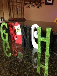 the letters have been made to look like christmas decorations