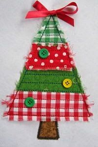 a christmas tree made out of fabric with buttons on the top and red gingham