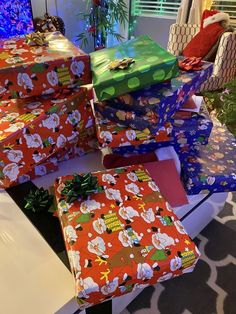 many presents are stacked on top of each other