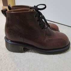 Vintage 90s, Doc Marten, heeled brown boots, made in England.  UK 6, US men 7, US women 8.  Uncommon style, excellent condition. Please read all measurements and view all photos provided before purchasing as I do NOT accept returns. I do my best to list accurate measurements and notate all visible flaws/signs of wear. I am happy to send additional pictures of any listing. I am not responsible for lost or damaged packages during shipping. Insurance can be purchased at an additional cost. International buyers please contact me for shipping quotes. Please note: Vintage items are not new and it is expected that there will be signs of age and wear. Vintage sizes run smaller than ones today, so the best method to judge size is to compare the above measurements to a garment you have that fits you Casual Brown Snip Toe Heeled Boots, Casual Brown Platform Boots With Square Toe, Retro Brown Plain Toe Boots, Retro Brown Boots With Plain Toe, Brown Casual Platform Boots With Square Toe, Casual Brown Square Toe Platform Boots, Classic Brown Platform Boots With Round Toe, Vintage Brown Martin Boots For Winter, Retro High-top Brown Boots