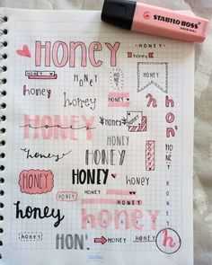 a notebook with some writing on it next to a pink marker and pen that says honey