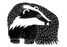 a black and white drawing of a badger on a white wall in the shape of a hedgehog