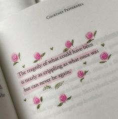 an open book with pink roses on it and a poem written in cursive writing