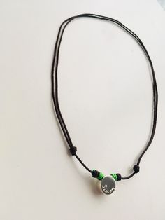 Necklace for boys with high quality, durable cord, contrasting thread knots and a hollow Sterling silver circle (1cm) which can be engraved. We offer a variety of colors for the knots and you can choose brown or black for the cord. The length can be adjusted by sliding on the knots. It makes a perfect birthday gift for a son, brother, cousin or friend. This BORN necklace was designed especially for boys who like wearing a personalized piece which is cheerful and fun. ENGRAVING BY HAND We can han Thread Knots, Necklace For Boys, Silver Keychain, Silver Circle, Perfect Birthday Gift, Eco Friendly Gifts, Perfect Birthday, Star Necklace, Hand Engraving