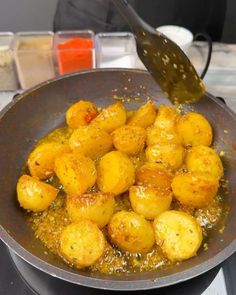 some food is being cooked in a frying pan