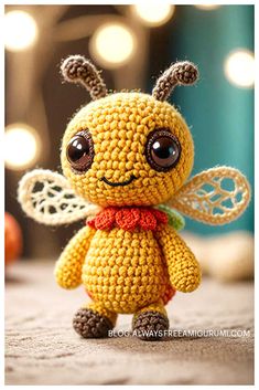 a small crocheted bee with big eyes