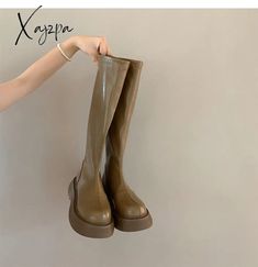 Brand Name: HoneyCherryBoot Type: BasicShaft Material: PUOutsole Material: RubberUpper Material: PUOrigin: Mainland ChinaCN: ZhejiangSeason: Spring/AutumnInsole Material: PUHeel Type: Square heelLining Material: PUBoot Height: Mid-CalfItem Type: BootsFashion Element: ROMEDepartment Name: AdultToe Shape: Round ToeHeel Height: High (5cm-8cm)With Platforms: NoStyle: Conciseis_handmade: YesPattern Type: SolidModel Number: AFit: Fits true to size, take your normal sizeClosure Type: Slip-On Trendy Knee-high Martin Boots For Spring, Trendy Spring Knee-high Martin Boots, Trendy Closed Toe Knee-high Boots For Fall, Trendy Closed Toe Knee-high Boots For Spring, Trendy Spring Knee-high Closed Toe Boots, Trendy Wide Calf Martin Boots With Round Toe, Trendy Wide Calf Martin Boots For Spring, Trendy Beige Knee-high Boots With Round Toe, Brown Round Toe Knee-high Boots For Spring