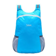 a blue backpack sitting on top of a white floor