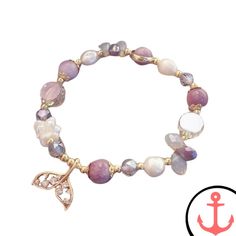 Experience the Magic with the Mermaid Glass Bead Bracelet Are you a passionate lover of the sea and all its enchanting symbols? Then the Mermaid Glass Bead Bracelet is just for you! As part of our beloved Mermaid Bracelet collection, this stunning piece captures the essence of the ocean and its mythical creatures. Features of the Mermaid Glass Bead Bracelet Exquisite Craftsmanship: Each bracelet is meticulously handcrafted, ensuring exceptional quality and attention to detail. Premium Materials: Ocean-inspired Beaded Bracelets With Round Beads, Ocean-inspired Beaded Round Bead Bracelets, Ocean-inspired Beaded Round Bracelets, Ocean-inspired Beaded Bracelet Jewelry, Ocean-inspired Bracelets With Colorful Beads For Gifts, Ocean-inspired Bracelets With Colorful Beads As Gifts, Adjustable Ocean-inspired Beaded Bracelets With Lobster Clasp, Ocean-inspired Beaded Bracelets For Gifts, Ocean-inspired Beaded Bracelets As Gifts