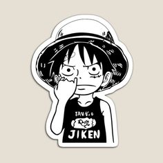 a sticker with an image of a person wearing a hat and holding their hand to his face